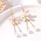 Dangling Pearls Suspended on White Petals Earring