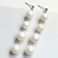 Dangling White Pearls Earring