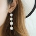 Dangling White Pearls Earring